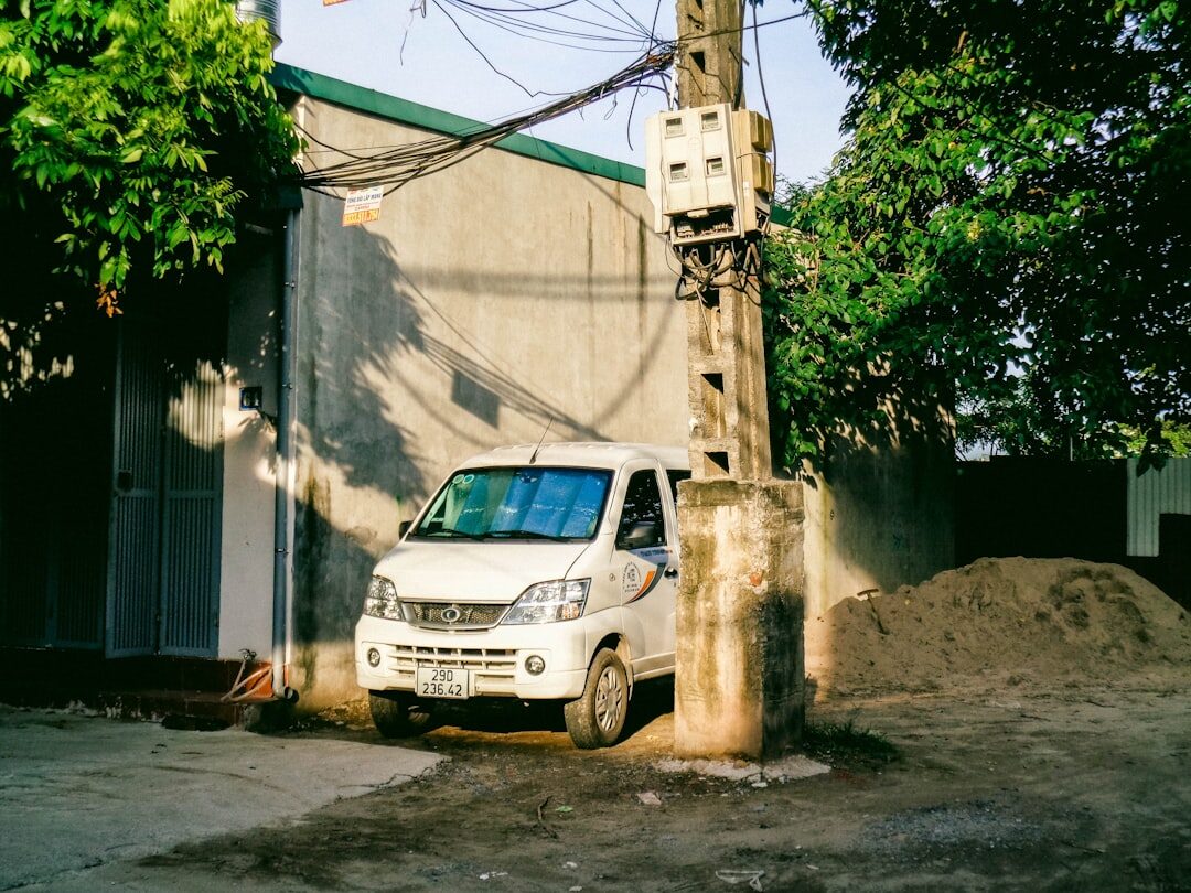 Outside broadcast van with satellite dish and cables