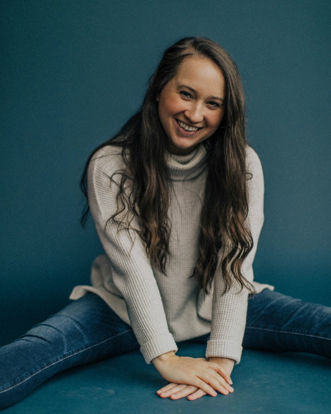 Studio portrait of a woman instructor smiling